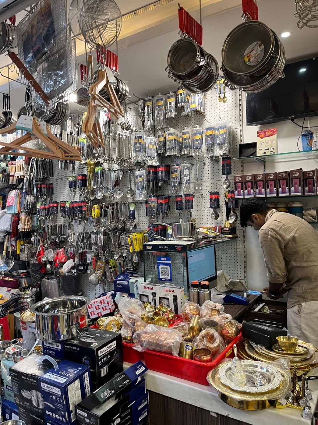 Billing counter with cookware and brassware
